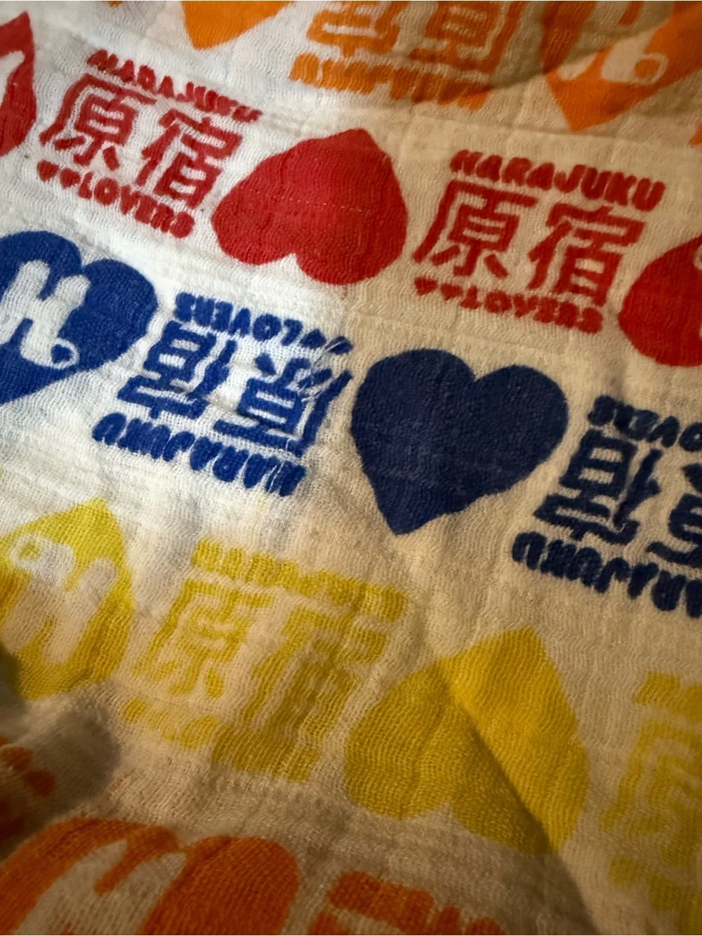 aden + anais White Cotton baby blanket with Harajuku lovers print